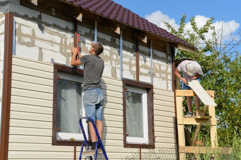 Repaired Vinyl Siding in Progress